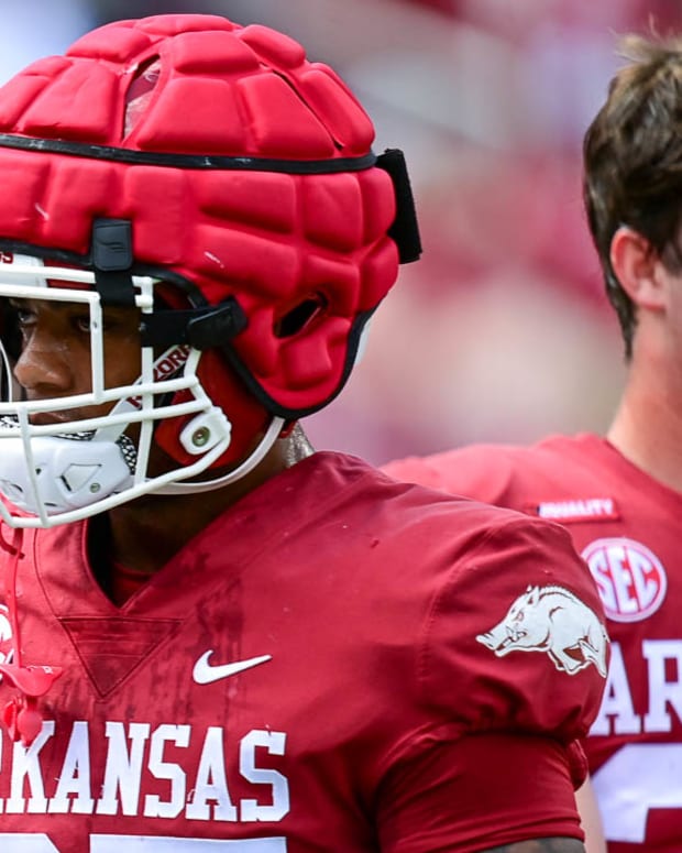 Razorbacks linebacker Chris "Pooh" Paul and Antonio Grier
